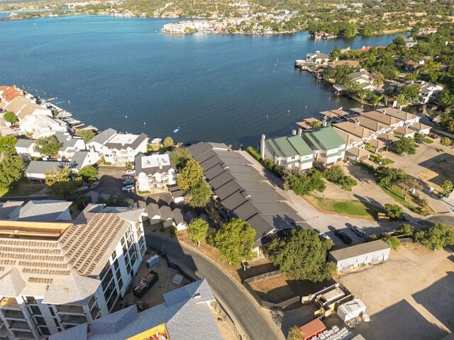 bird's eye view featuring a residential view and a water view