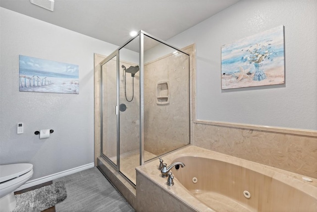 bathroom featuring visible vents, toilet, a stall shower, a tub with jets, and baseboards