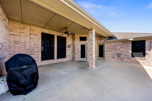 view of patio featuring grilling area and ceiling fan