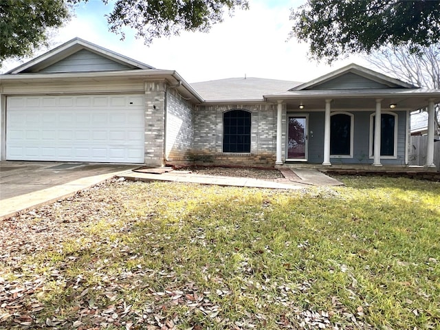 ranch-style house with brick siding, driveway, a front lawn, and a garage