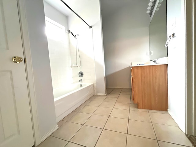 bathroom with tile patterned flooring, bathing tub / shower combination, vanity, and baseboards