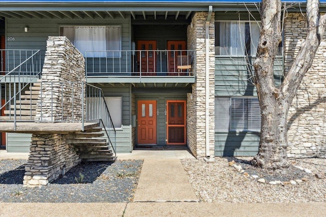 property entrance with a balcony