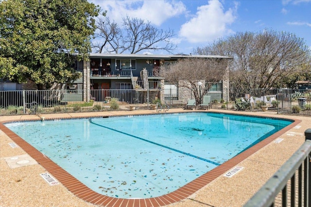 community pool with fence