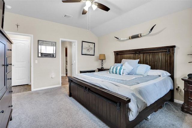 bedroom featuring visible vents, ceiling fan, baseboards, and lofted ceiling