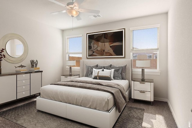 carpeted bedroom featuring visible vents, a ceiling fan, and baseboards