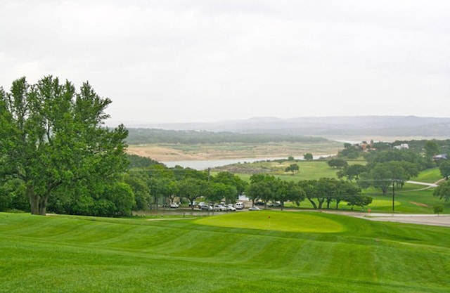 surrounding community with view of golf course