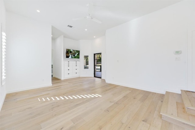 empty room featuring recessed lighting, baseboards, visible vents, and light wood-type flooring