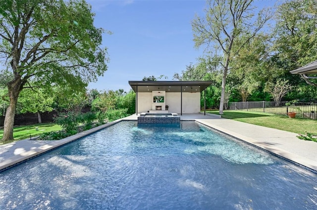 view of pool featuring a patio area, a yard, fence, and a pool with connected hot tub