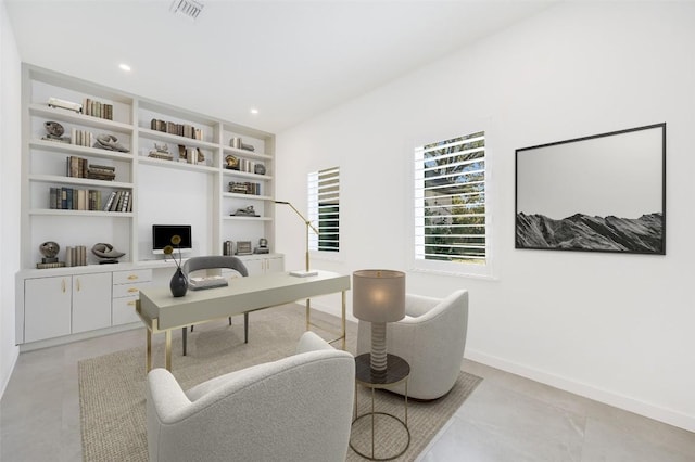 home office with recessed lighting, visible vents, and baseboards