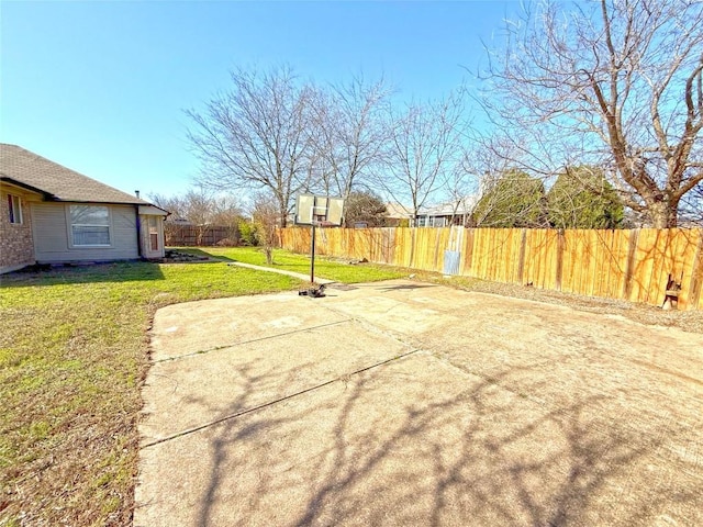 view of yard with a patio area and fence