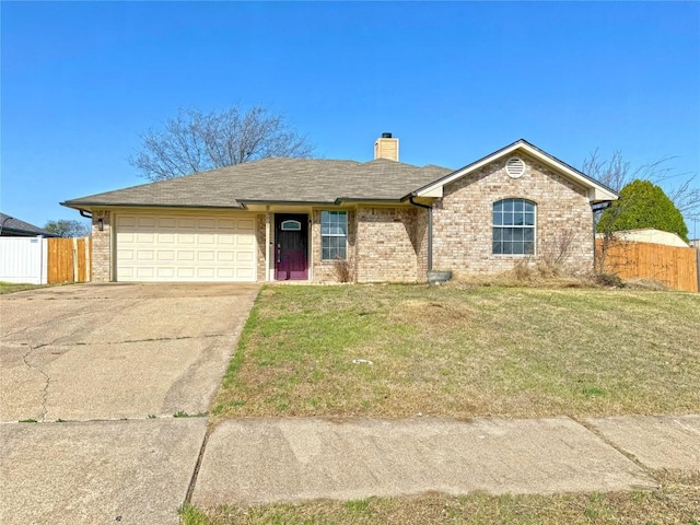 single story home featuring an attached garage, driveway, a front yard, and fence