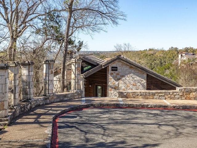 view of front of home featuring stone siding