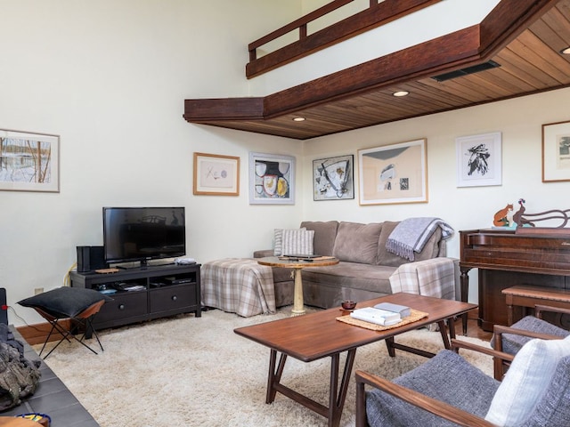 living area featuring recessed lighting, wood ceiling, and visible vents