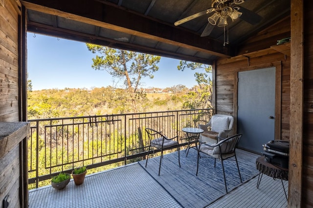 balcony featuring ceiling fan