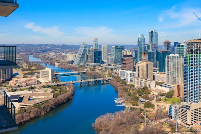 aerial view featuring a view of city and a water view