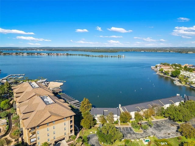 drone / aerial view with a water view