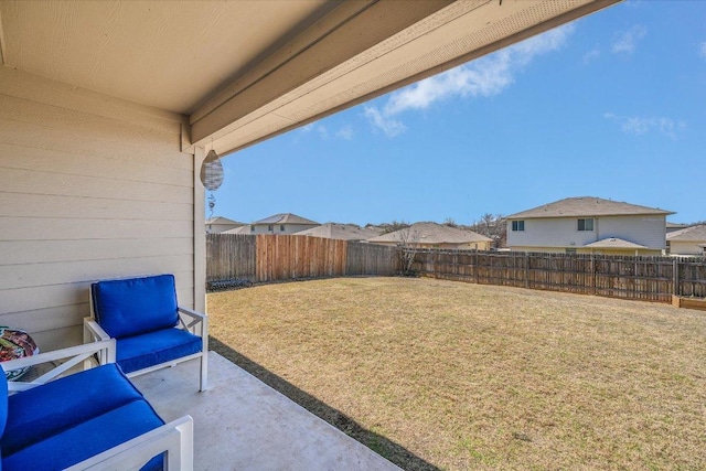 view of yard with a patio and a fenced backyard