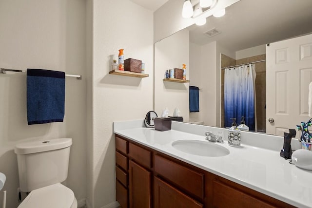 full bath featuring visible vents, toilet, vanity, and a shower with curtain