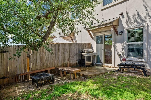 view of yard with a patio and fence