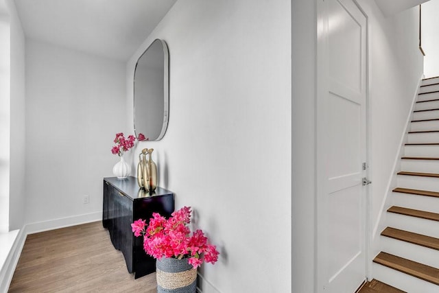281 Pullman Ct, Round Rock, TX 78664 - hall featuring stairway and light wood finished floors