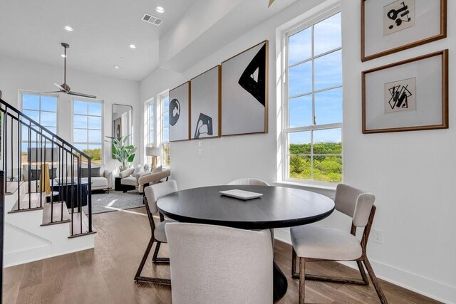 281 Pullman Ct, Round Rock, TX 78664 - dining area featuring plenty of natural light, ceiling fan, stairway, wood finished floors, and recessed lighting