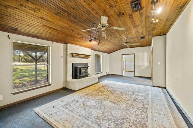 unfurnished living room featuring visible vents, track lighting, baseboards, vaulted ceiling, and wooden ceiling