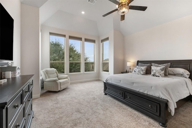 bedroom featuring a ceiling fan, baseboards, visible vents, vaulted ceiling, and light colored carpet