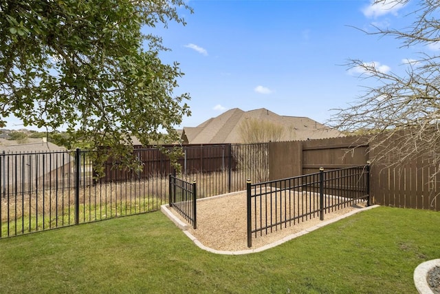 view of yard featuring a fenced backyard