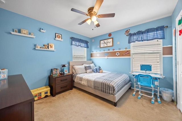 carpeted bedroom featuring a ceiling fan