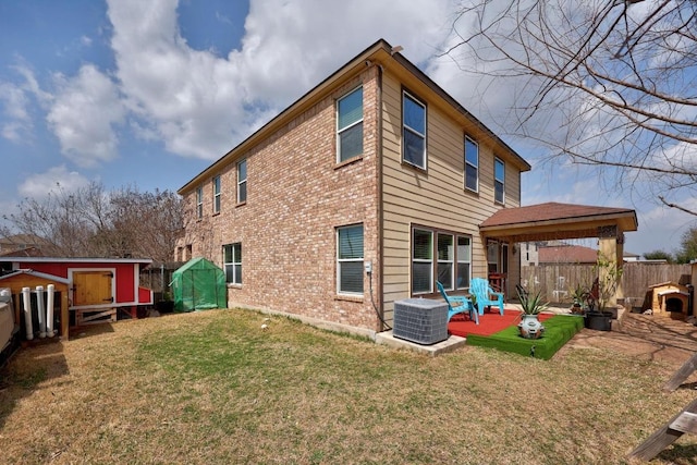 9017 Edmundsbury Dr, Austin, TX 78747 - back of house with a gazebo, a fenced backyard, a patio area, and brick siding