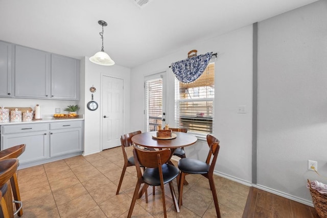 dining space with baseboards