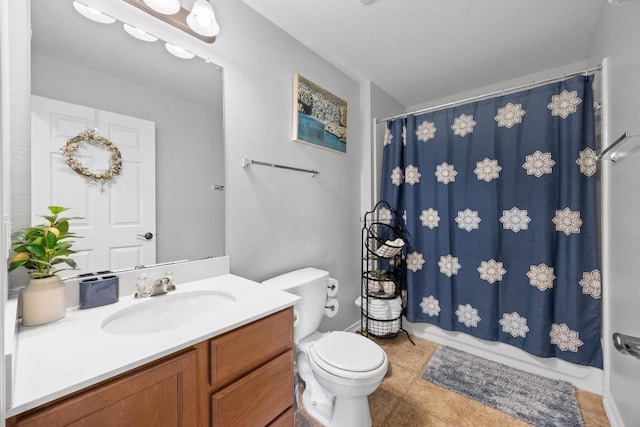 full bath with vanity, toilet, shower / bath combo with shower curtain, and tile patterned flooring