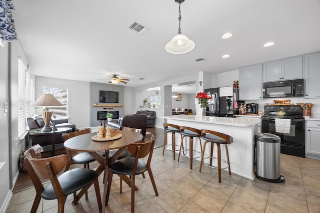 dining room with recessed lighting, visible vents, light tile patterned flooring, and ceiling fan