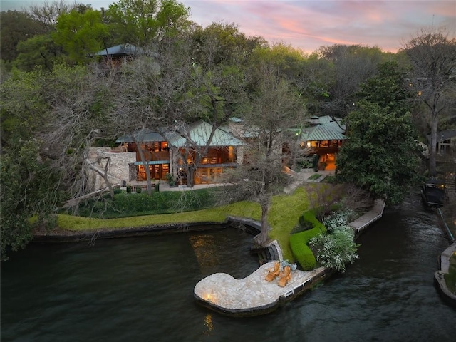 drone / aerial view with a water view