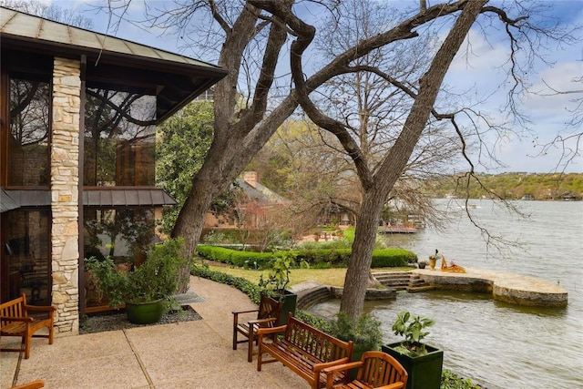 view of patio / terrace featuring a water view