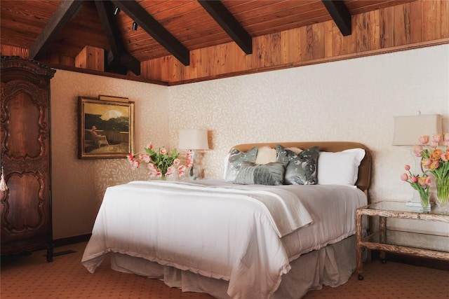 bedroom featuring wallpapered walls, wooden ceiling, carpet flooring, and vaulted ceiling with beams