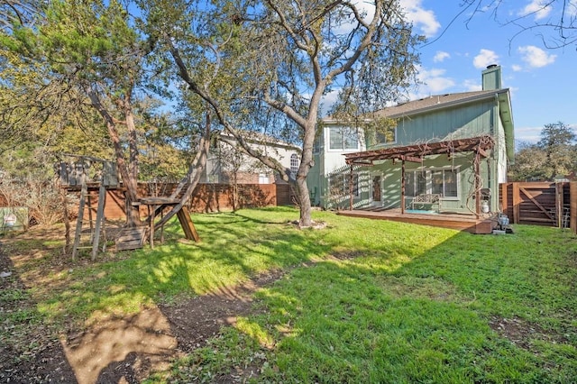 view of yard with a fenced backyard and a pergola