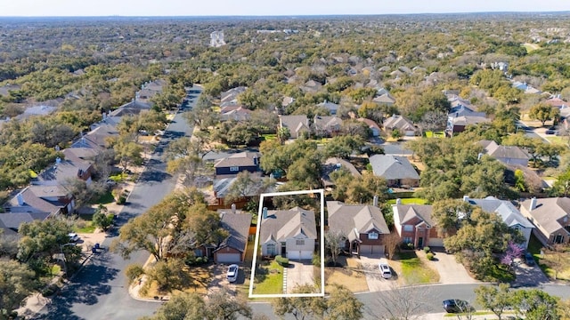 6303 Sam Maverick Pass, Austin, TX 78749 - aerial view of property and surrounding area with property boundaries highlighted and nearby suburban area