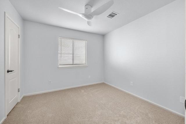 6303 Sam Maverick Pass, Austin, TX 78749 - unfurnished room with light colored carpet, a ceiling fan, and baseboards