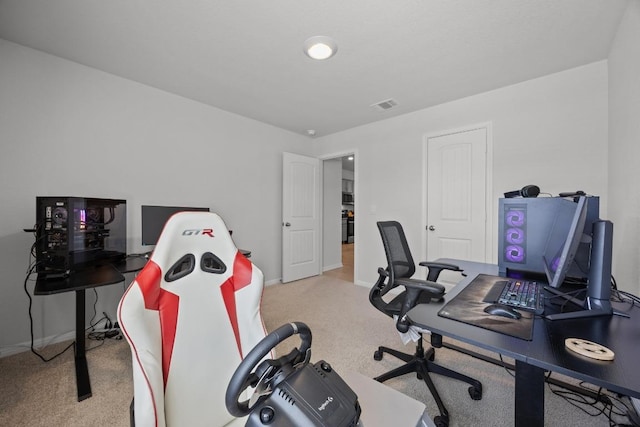 home office featuring visible vents, baseboards, and carpet