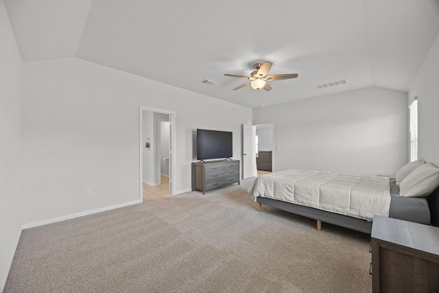 bedroom with baseboards, visible vents, lofted ceiling, and light carpet