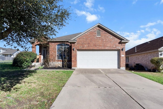 ranch-style house featuring brick siding, a garage, driveway, and a front yard