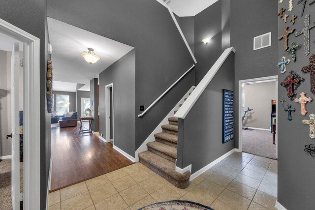 2157 Paradise Ridge Dr, Round Rock, TX 78665 - tiled foyer featuring stairs and baseboards