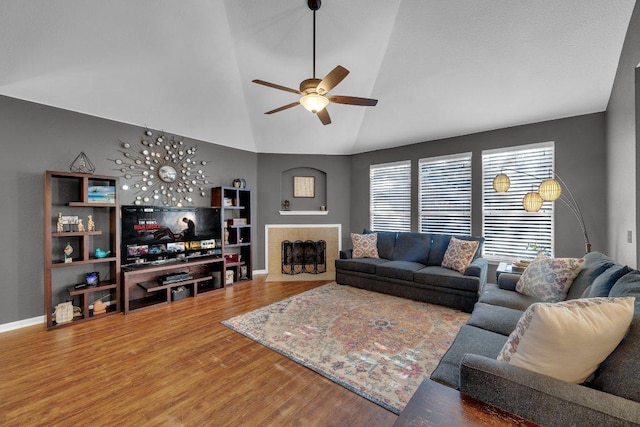 2157 Paradise Ridge Dr, Round Rock, TX 78665 - living area with wood finished floors, a ceiling fan, baseboards, and lofted ceiling