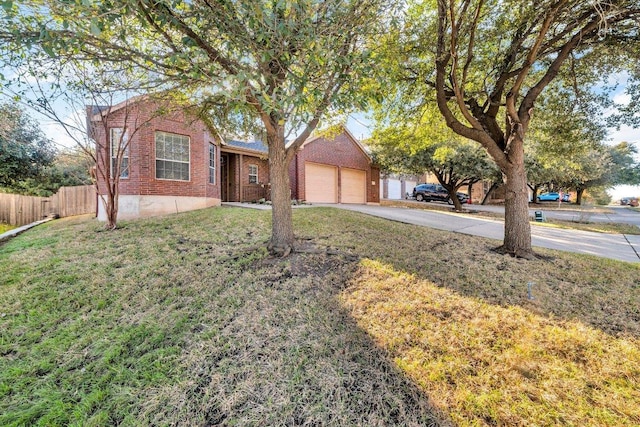 2157 Paradise Ridge Dr, Round Rock, TX 78665 - view of front of property featuring driveway, brick siding, and an attached garage