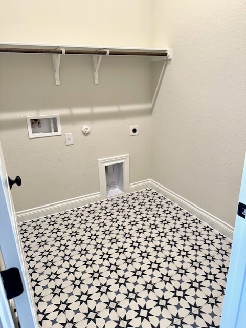 laundry area featuring laundry area, hookup for an electric dryer, baseboards, and hookup for a gas dryer