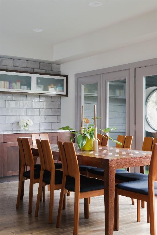 dining space featuring light wood-type flooring