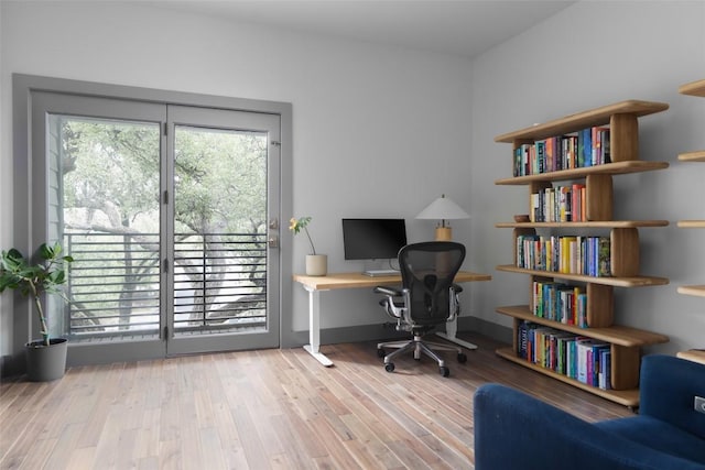 office area with wood finished floors