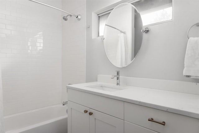 full bath with vanity and shower / tub combo