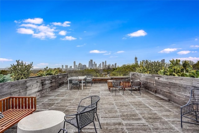 view of patio / terrace featuring a city view